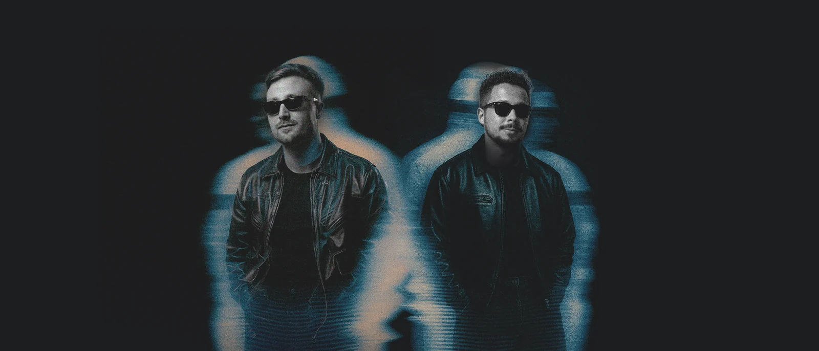 The OAKES duo against a dark background with blue motion trails